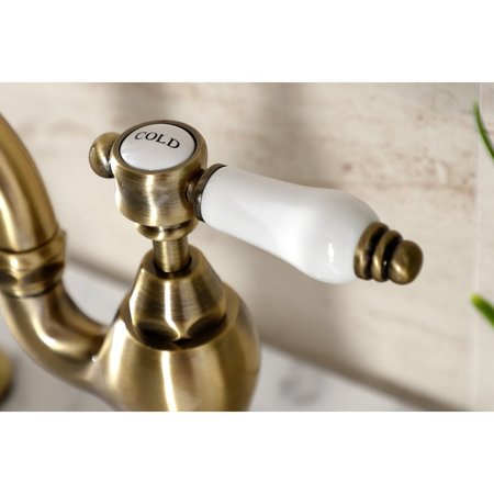 Kingston Brass Bridge Bathroom Faucet with Brass PopUp, Antique Brass KS7973BPL